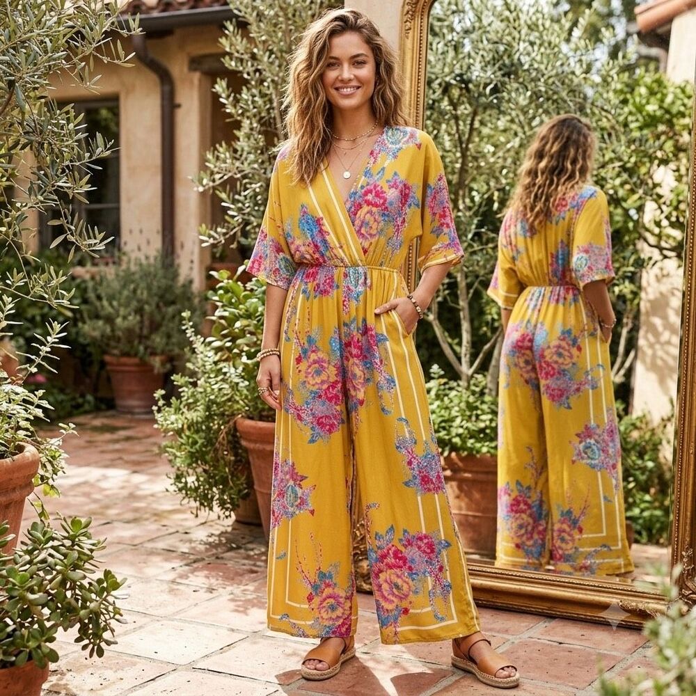 Flying Tomato size XS mustard floral jumpsuit.
